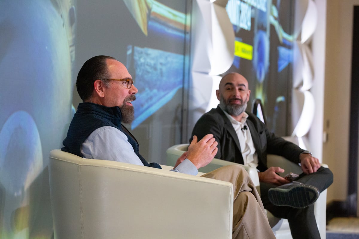 Dominic Perez, CTO of Curtiss Wright, and Andy Windon, VP of Engineering & Technology at CAE Defense and Security, in a Fireside Chat on Bridging Digital Frontiers: Making Advancements and Overcoming Hurdles in Digital Transformation.